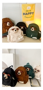 Detail showing high-quality corduroy texture and 3D cartoon dog head on colorful kid backpacks