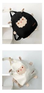 Close-up of cute cartoon sheep backpack detailing the premium thick canvas material