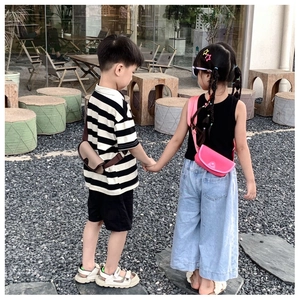 Kids fashion PU mini crossbody bags in khaki and bright pink with adjustable straps