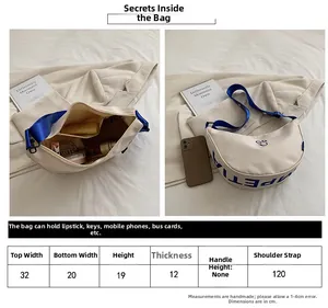 Detailed internal view and size chart of crescent canvas crossbody bag for children