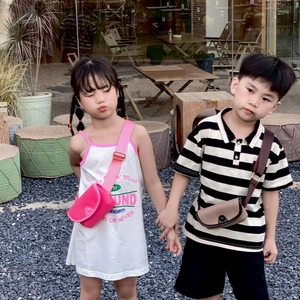 Stylish children's mini crossbody bags in pink and khaki with adjustable wide straps
