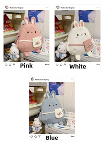 Detailed display of cute rabbit canvas shoulder bags in pink, white and blue colors
