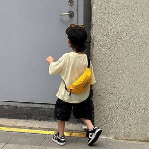 Trendy children's yellow canvas crossbody waist bag for toddlers and kids outdoors