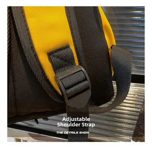 Detail view of the adjustable shoulder strap and high-density fabric on the yellow kids backpack