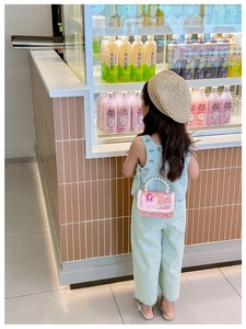 Pink sequin crossbody bag for girls with pearl handle and 3D fairy ornament detail