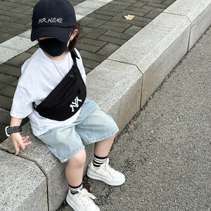 Kids black canvas waist bag with white NY logo and adjustable strap for boys and girls
