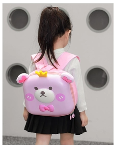 Pink cartoon bear backpack for toddlers featuring wide padded straps and hardshell design