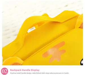Detail of yellow children backpack reinforced oxford handle for comfortable carrying