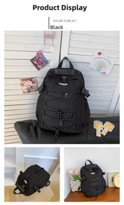 Detail view of black drawstring backpack with durable straps and functional buckles