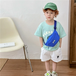 Kids blue canvas chest bag with adjustable strap and logo detail for boys and girls