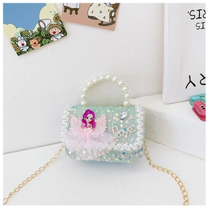 Detail of sequined kids bag with lace trim, fairy doll, pearl handle and gold chain