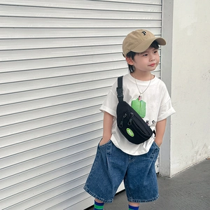Kids black nylon chest bag with peace label paired with stylish canvas street wear outfit