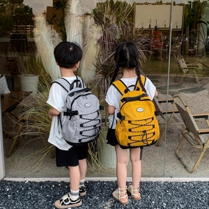 Kids lightweight outdoor drawstring backpack in grey and yellow with fashion patch
