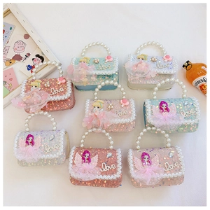 Detail of sequin mini bags with pearl handles and 3D princess decor for little girls