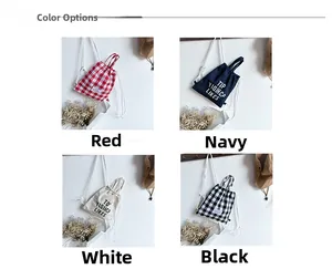 Detailed view showing four colors of small canvas checkerboard backpacks for kids