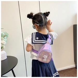 Rear view of child wearing purple laser PU chest bag with quicksand bunny detail