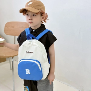 Kids lightweight canvas backpack with blue-white contrast and letter R embroidery