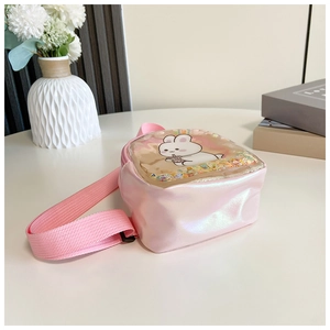Macro detail of kids pink holographic bunny crossbody bag with glitter sequins