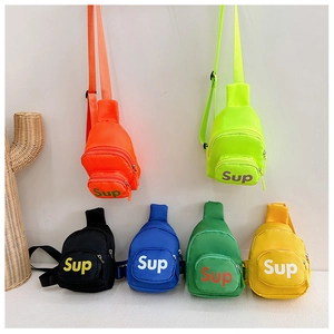 Close-up of colorful canvas crossbody chest bags for kids with adjustable straps
