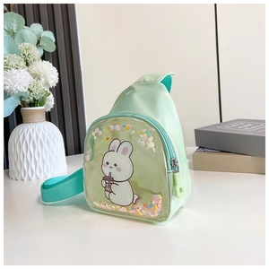 Detail of mint green PU leather kids bag with cute bunny print and colorful sequins