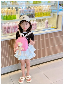 Pink toddler canvas backpack featuring a 3D plush bear on adjustable white straps
