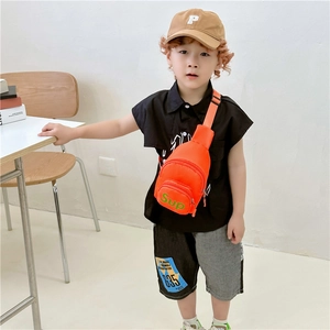 Fashionable bright orange canvas crossbody chest bag for kids with green letter print