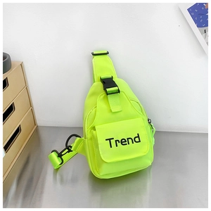 Detail of neon green nylon chest bag with Trend logo, plastic buckle and adjustable strap