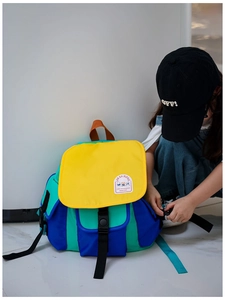 Close-up of lightweight nylon backpack for kids with vibrant color-block design