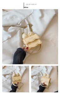 Gros plan sur un mini sac jaune avec nœud 3D et rabat découpé en forme de vagues