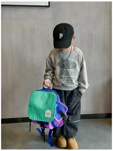 Fashionable color-block canvas backpack for kids featuring durable nylon and thick straps