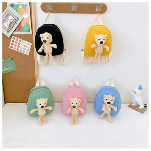 Detailed view of canvas kids backpacks with 3D teddy bears in multiple colors