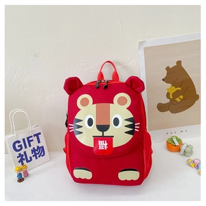 Detail view of red tiger canvas backpack with Chinese Fu character for children