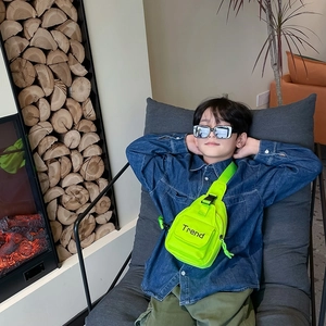 Neon green kids canvas chest bag with Trend lettering for boys and girls fashion