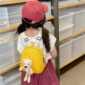 Toddler yellow canvas backpack with cute 3D plush bear and white adjustable straps