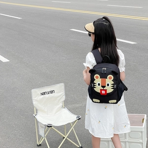 Cute black toddler backpack with cartoon tiger design and festive elements for kids
