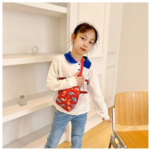 Toddler cartoon dinosaur chest bag in vibrant red with adjustable shoulder strap