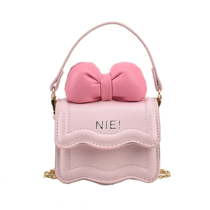 Petit sac à bandoulière rose pour filles avec nœud décoratif et chaîne dorée