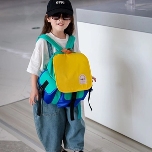 Kids color-block canvas backpack with durable nylon fabric and adjustable straps