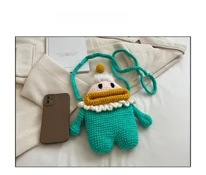 Borsa a tracolla lavorata a mano verde menta con cartone animato e cinturino intrecciato