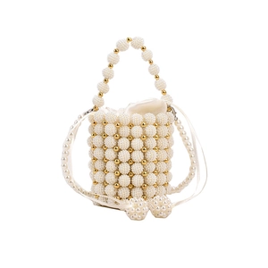 Cute pearl woven bucket handbag for girls with satin drawstring liner and golden beads