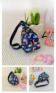 Detail of dark blue waterproof chest bag for kids with dinosaur and unicorn prints