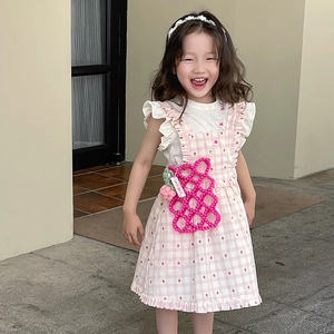 Handmade beaded crossbody bag for girls with pink floral hollow crochet design for autumn