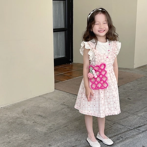 Girl's pink plaid pinafore dress with lace collar shirt and beaded crossbody bag