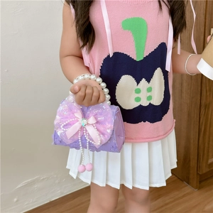 Sac bandoulière fille en dentelle violette avec nœud rose et poignée en perles