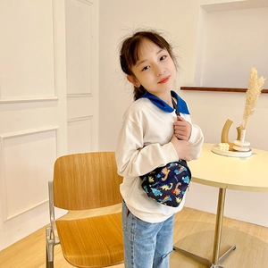 Toddler navy crossbody bag with colorful cartoon dinosaur prints and adjustable strap