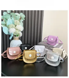 Close-up of crocodile pattern mini PU bags in seven colors for toddler girls