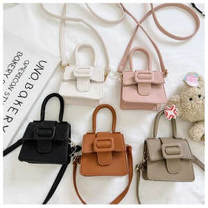 Litchi pattern PU mini saddle bags in five colors with decorative buckles for girls