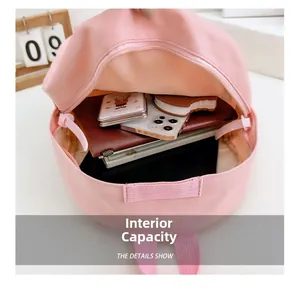 Innenkapazität des rosa Kinderrucksacks mit Platz für Tablet und Notizbücher