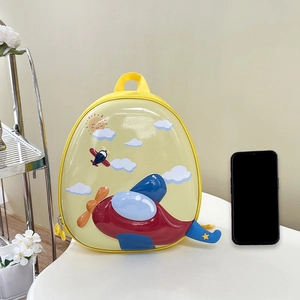 Cute yellow airplane hardshell backpack for kids with red propeller and blue tail fin