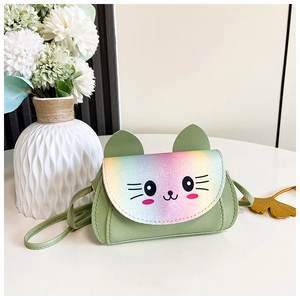 Detail of cute cat-shaped crossbody bag with rainbow sequins and mint green leather